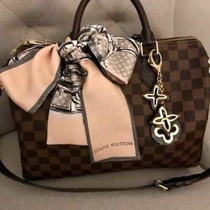 Louis Vuitton bandeau/twilly with trunks and bags print.